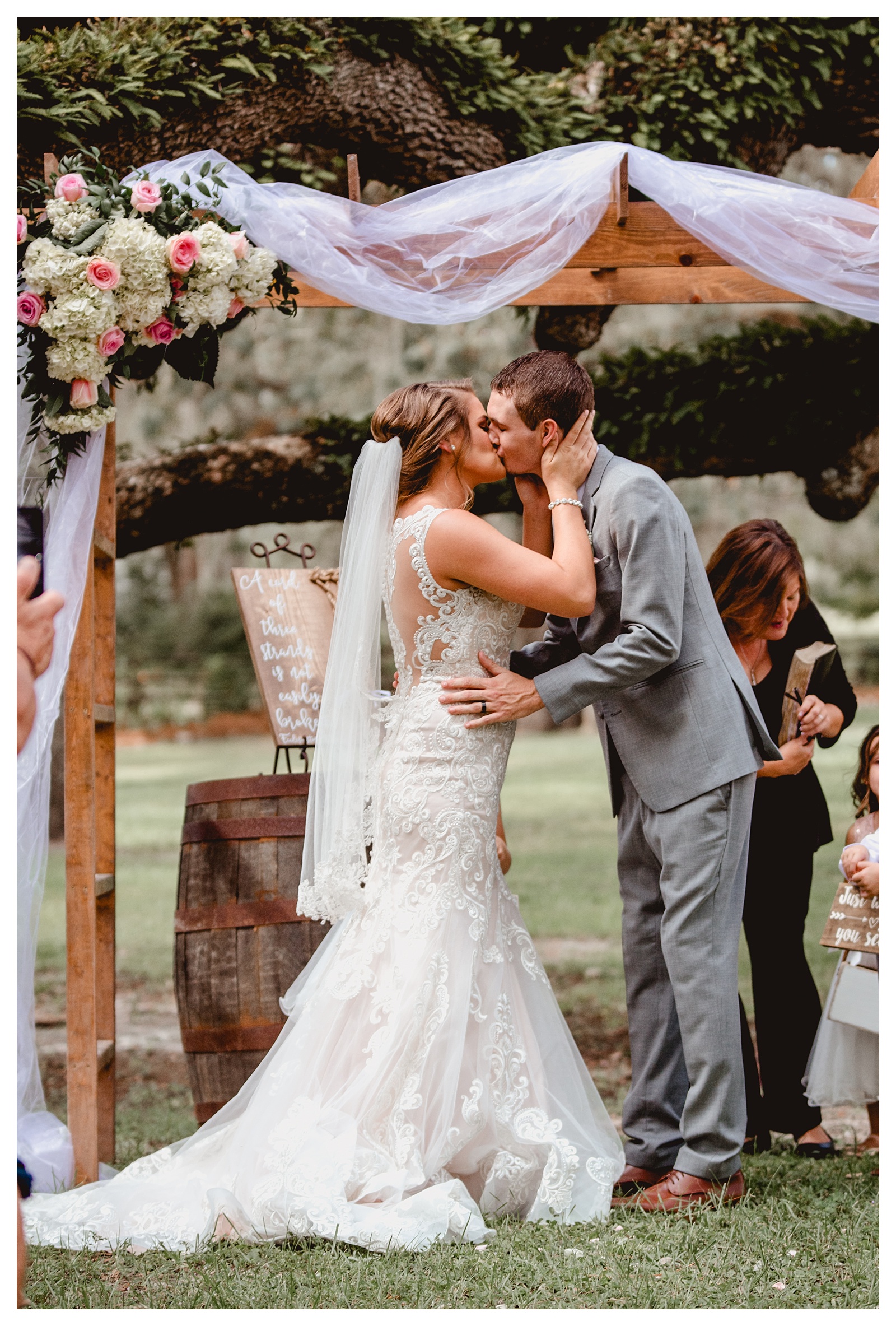 Couples first kiss as a married couple. Lake City wedding photographer Shelly Williams Photography