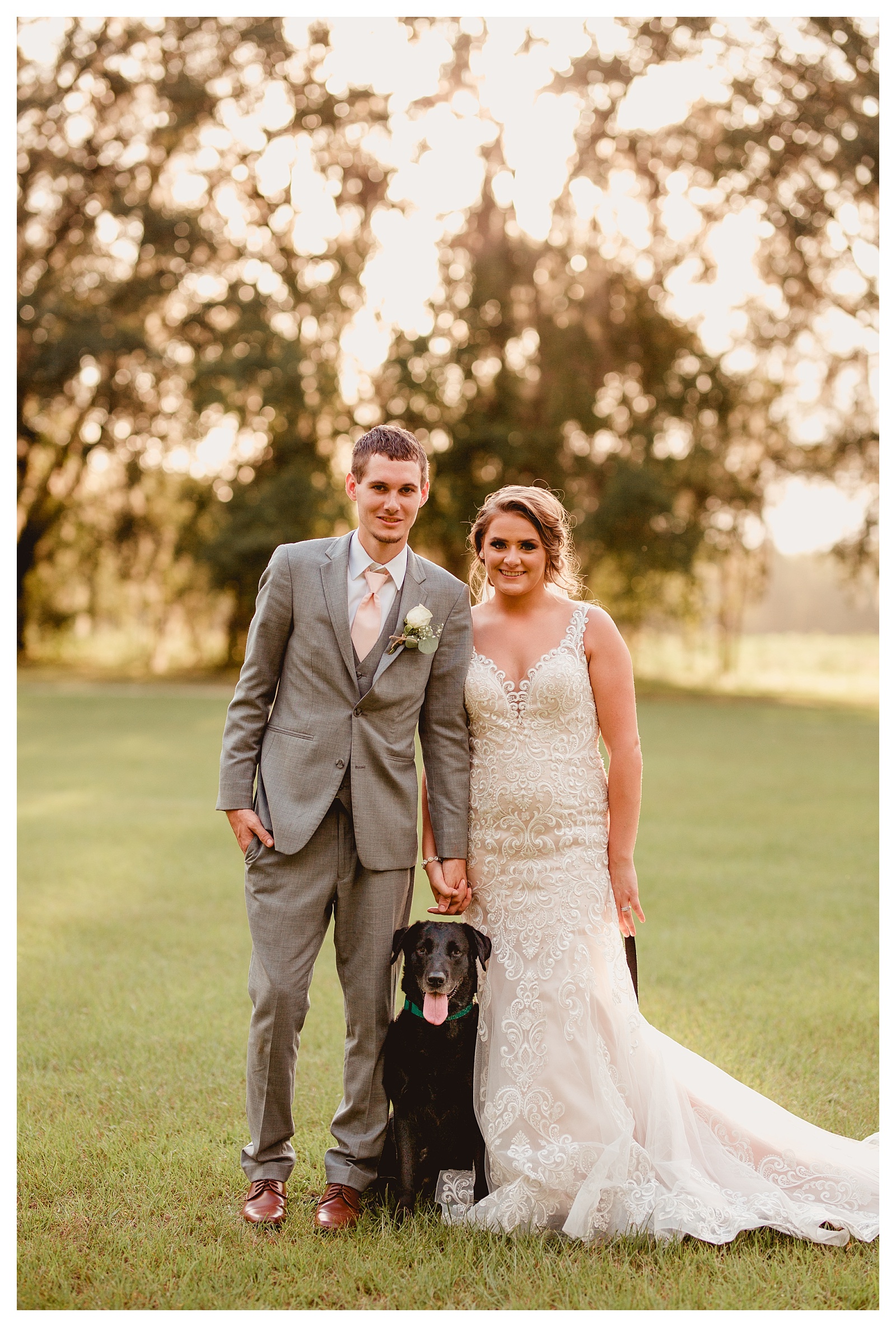 Family portrait of the dog, groom, and bride on their wedding day. Shelly Williams Photography