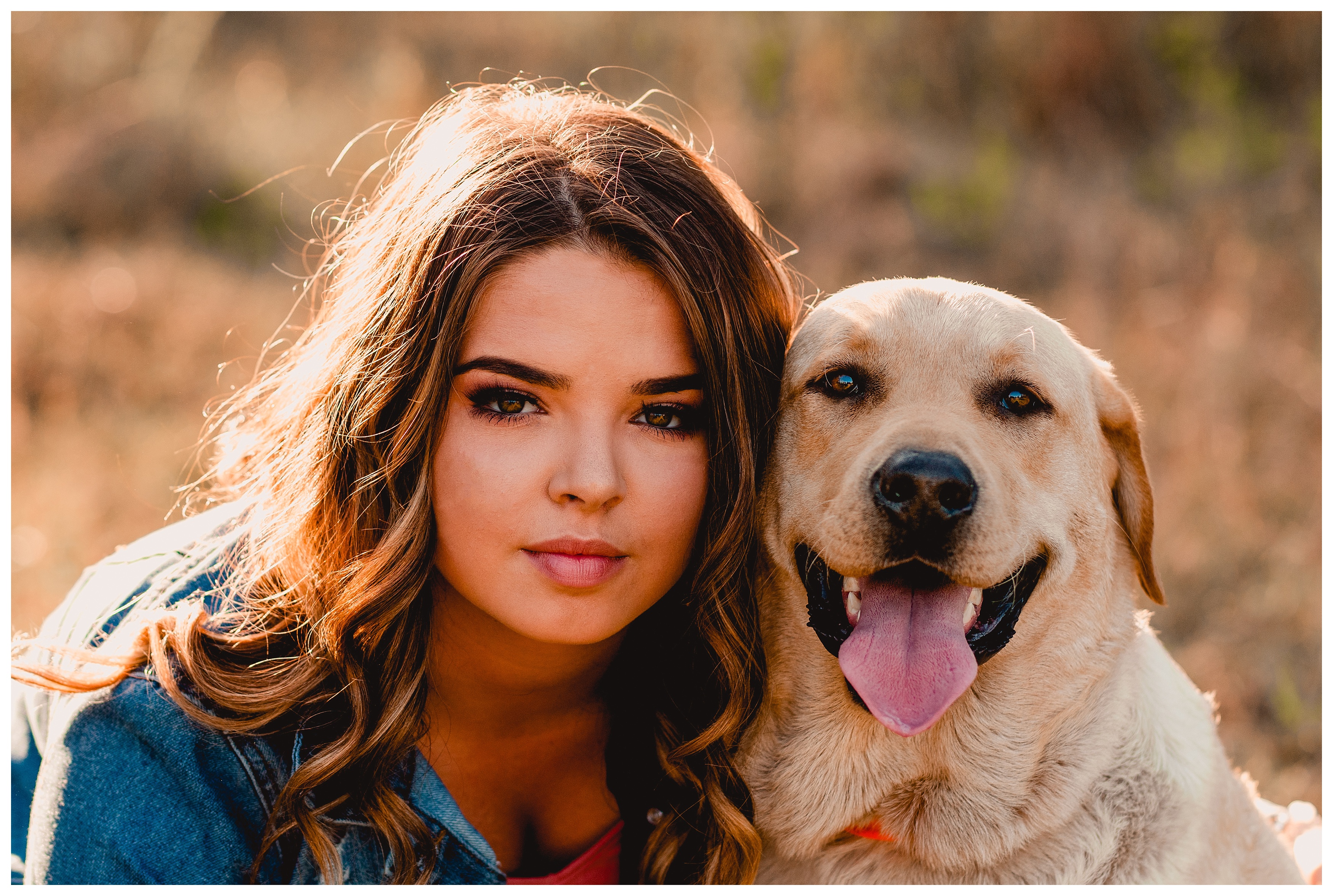 Close up photo of high school senior with her dog. Dog photography showing the bond between pup and girl. Shelly Williams Photography