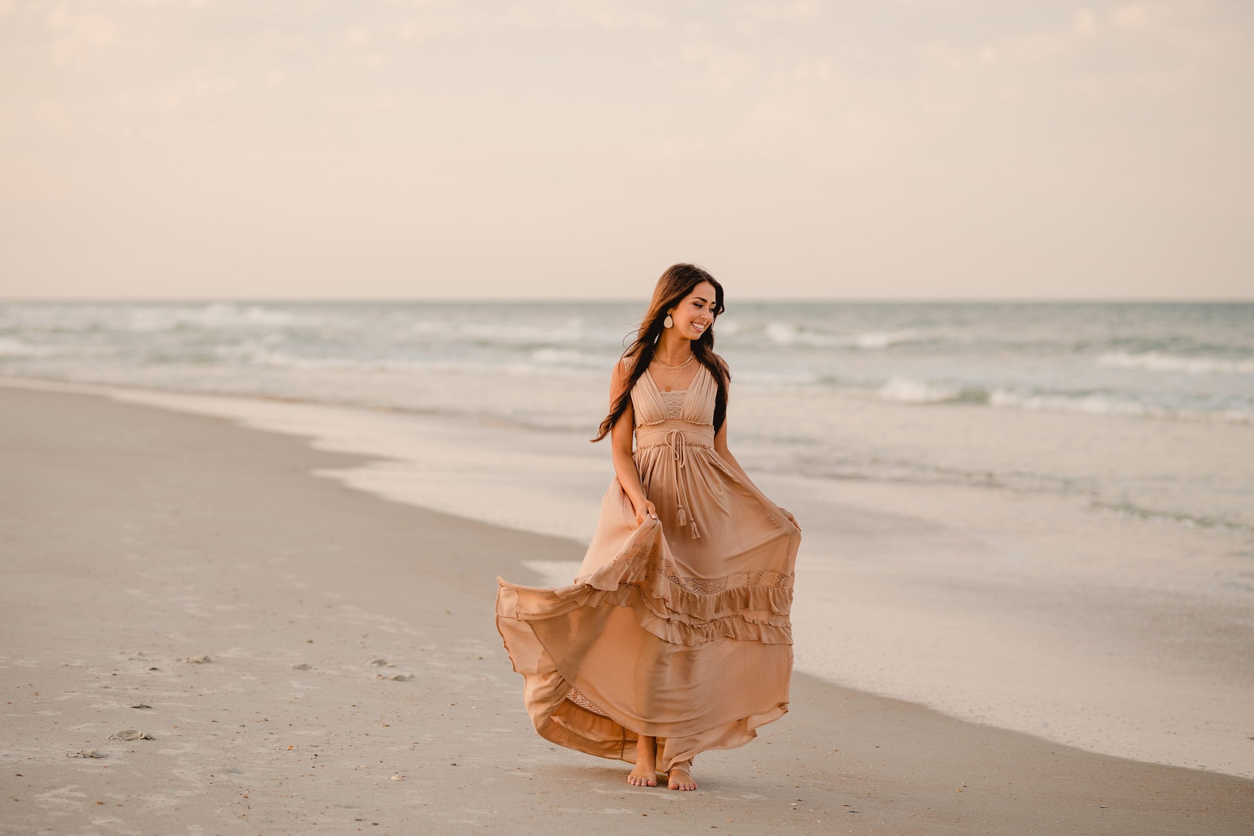 Senior pictures on the beach in St Augustine, FL. Freepeople dress